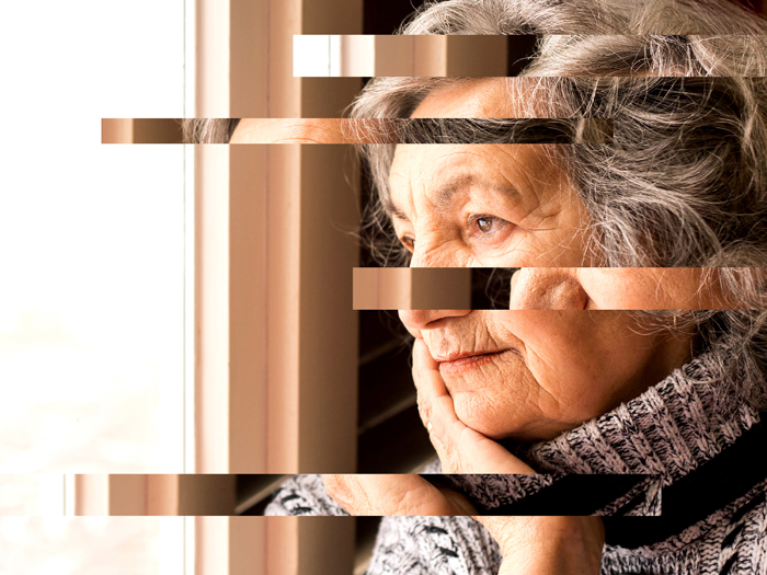 older woman looking out window