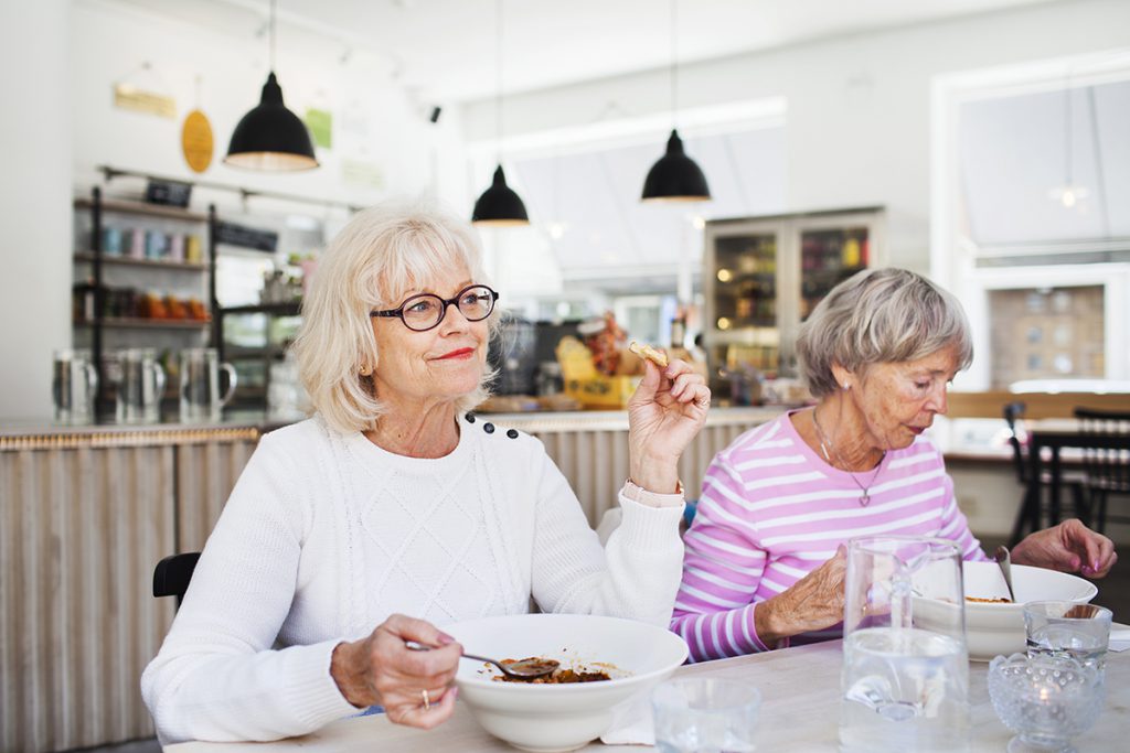 Senior women eating at a restaurant