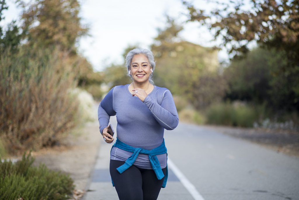 Mature woman out for an easy jog