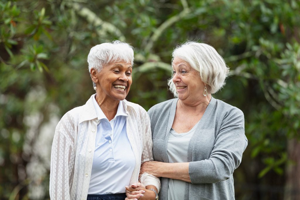 two senior women taking a walk for a story on Ozempic and other weight loss drugs for seniors